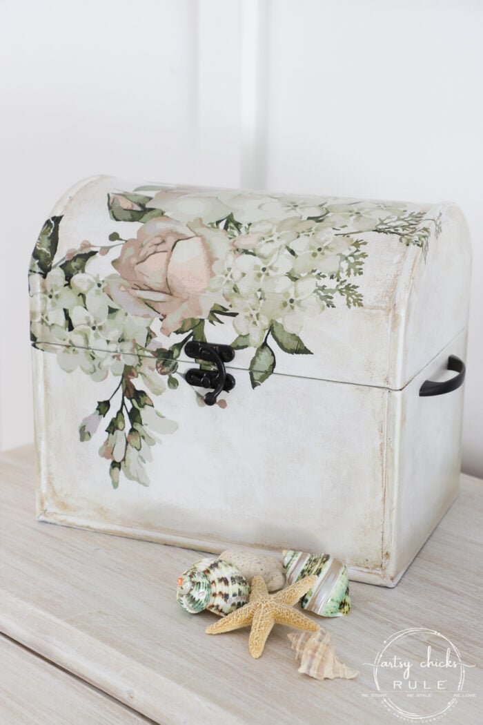 aged white box with pink and green florals