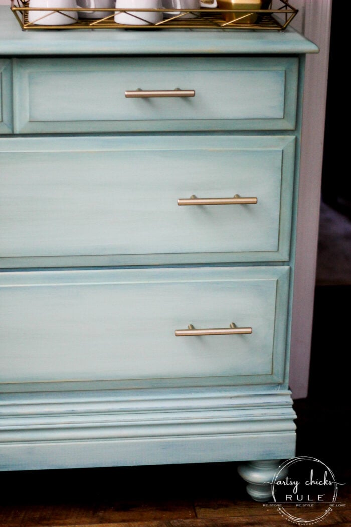 aqua dresser with gold bar handles