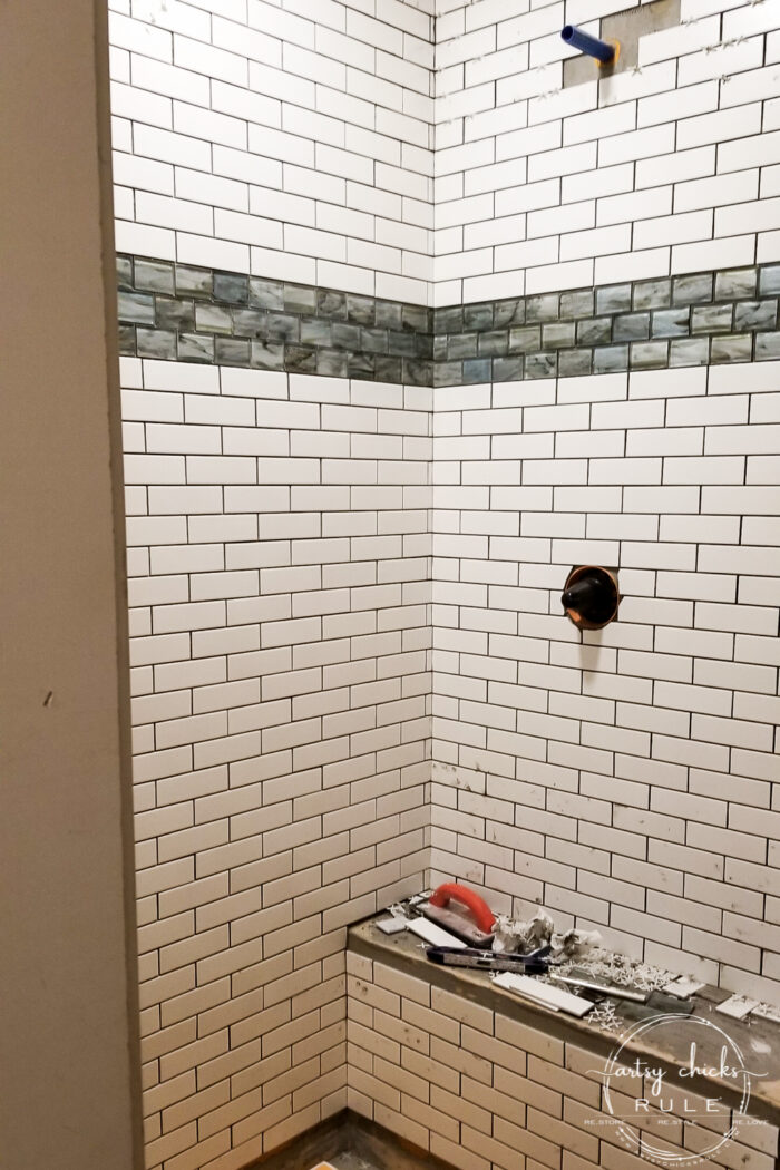 Our master bathroom remodel is underway! Tile choices (that "water" look tile is the bomb!), shiplap, new windows and more! artsychicksrule.com #coastalbathideas #subwaytile #bathroommakeover #bathroomremodel