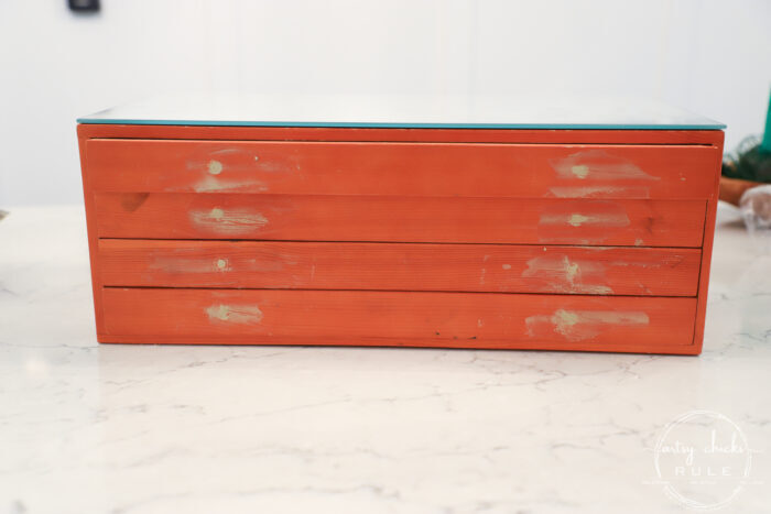 This old, orange box got a brand new look...and use! A little paint, mirror, fabric and a pretty transfer makes the prettiest jewelry box mirror top! artsychicksrule.com #jewelrybox #primatransfers #primaredesign #repurposedfinds 
