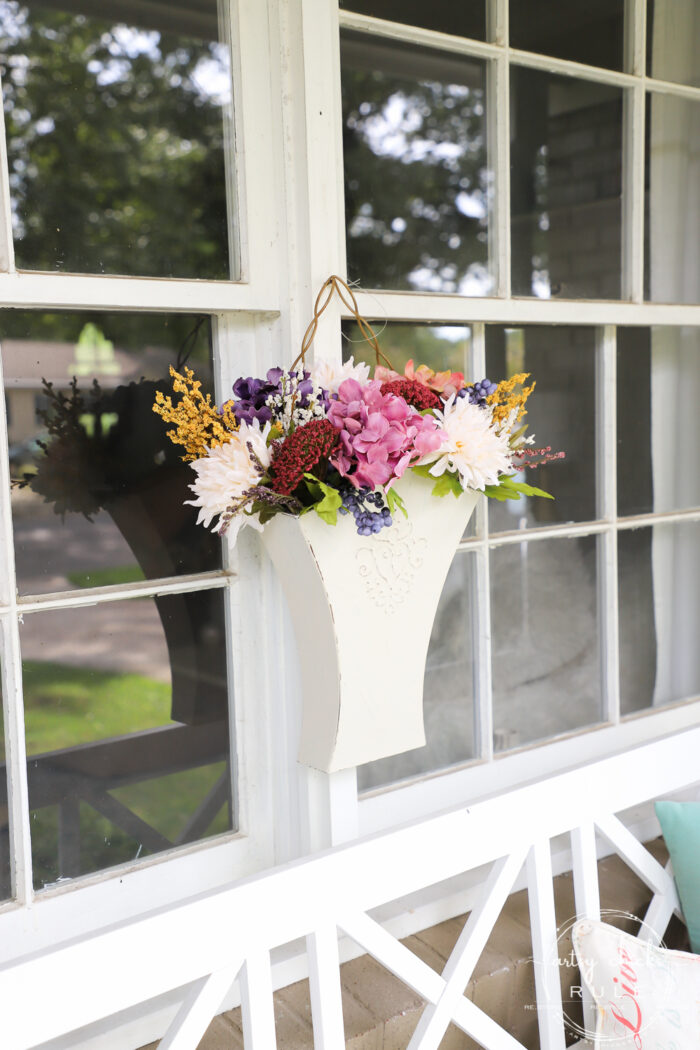 Goodbye to summer and hello to beautiful fall with this COLORFUL fall floral bucket! artsychicksrule.com #colorfulfall #falldecor #fallcrafts #fallflowers #fallideas