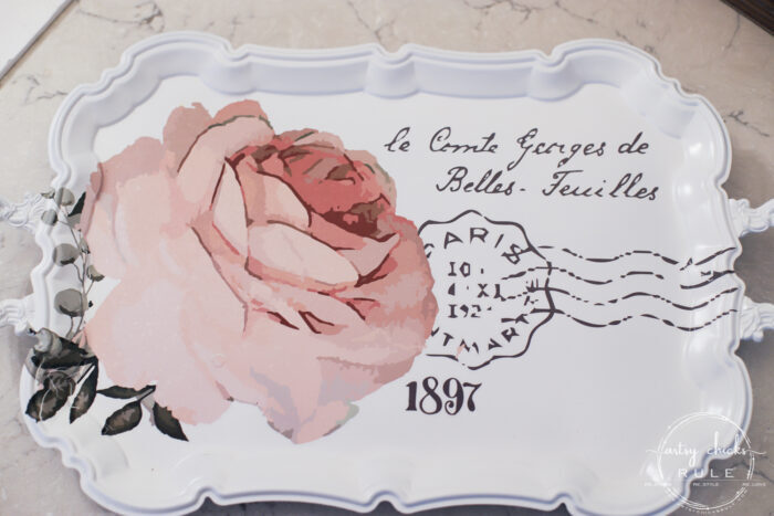 This pretty French rose decal was the perfect addition to this old metal thrift store tray! artsychicksrule.com #primatransfers #redesignwithprima #rosedecal #frenchstyle #frenchdecor #traymakeover