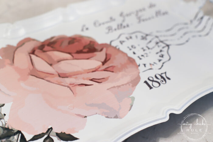 This pretty French rose decal was the perfect addition to this old metal thrift store tray! artsychicksrule.com #primatransfers #redesignwithprima #rosedecal #frenchstyle #frenchdecor #traymakeover