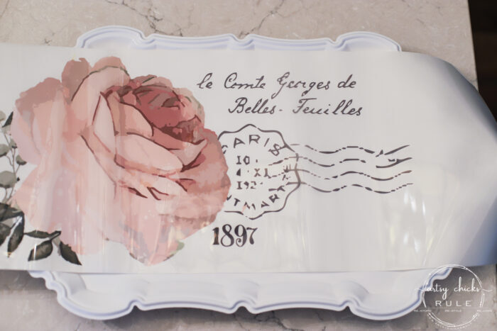 This pretty French rose decal was the perfect addition to this old metal thrift store tray! artsychicksrule.com #primatransfers #redesignwithprima #rosedecal #frenchstyle #frenchdecor #traymakeover