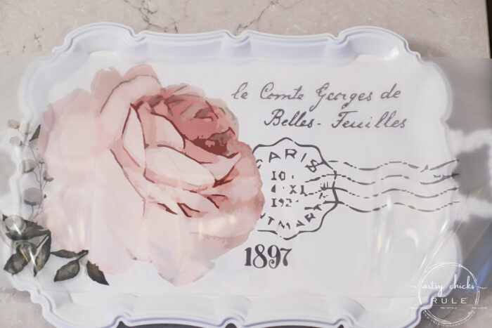 This pretty French rose decal was the perfect addition to this old metal thrift store tray! artsychicksrule.com #primatransfers #redesignwithprima #rosedecal #frenchstyle #frenchdecor #traymakeover