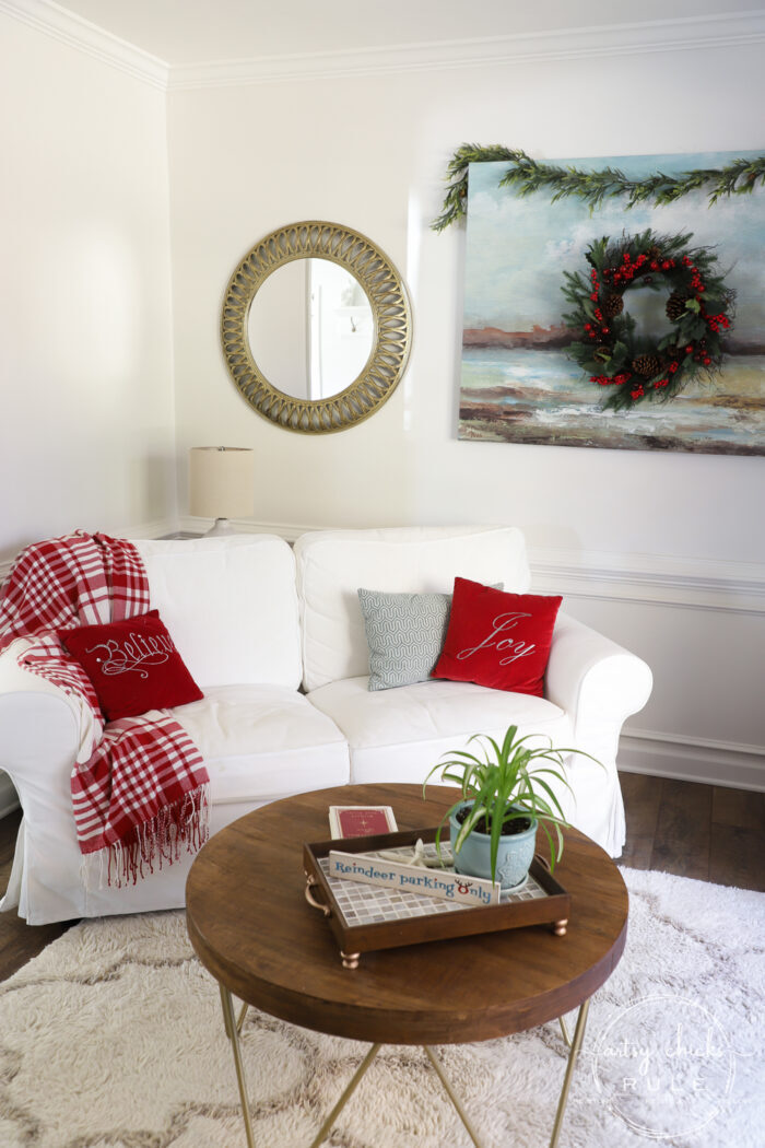 Cozy Christmas decor in traditional reds creates a warm, nostalgic and welcoming space! Simple ideas to create a holiday space you'll love! #cozychristmas #redchristmasdecor #tradtionalredchristmas