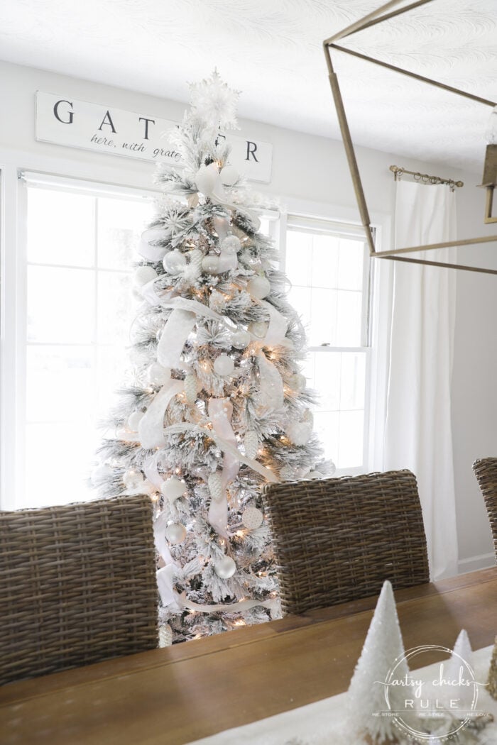 White Christmas Decor Ideas - make for a magical Christmas! I'm sharing our foyer and dining rooms all decked out in white! artsychicksrule.com #whitechristmas #whitechristmasdecor #whitedecorideas 