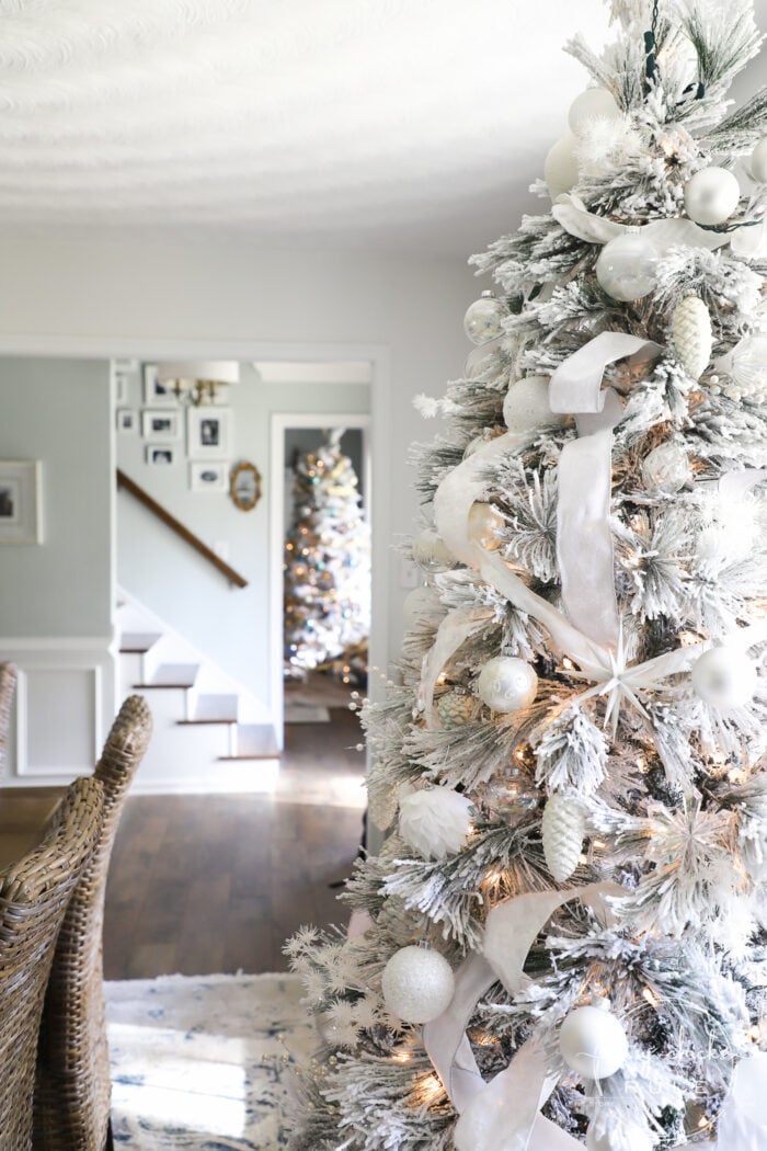 White Christmas Decor Ideas - make for a magical Christmas! I'm sharing our foyer and dining rooms all decked out in white! artsychicksrule.com #whitechristmas #whitechristmasdecor #whitedecorideas 