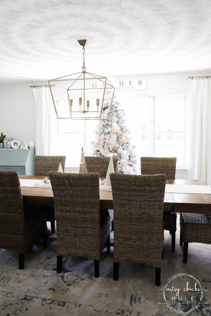 White Christmas Decor Ideas - make for a magical Christmas! I'm sharing our foyer and dining rooms all decked out in white! artsychicksrule.com #whitechristmas #whitechristmasdecor #whitedecorideas 
