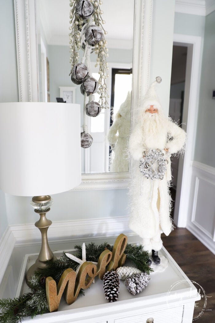 White Christmas Decor Ideas - make for a magical Christmas! I'm sharing our foyer and dining rooms all decked out in white! artsychicksrule.com #whitechristmas #whitechristmasdecor #whitedecorideas 