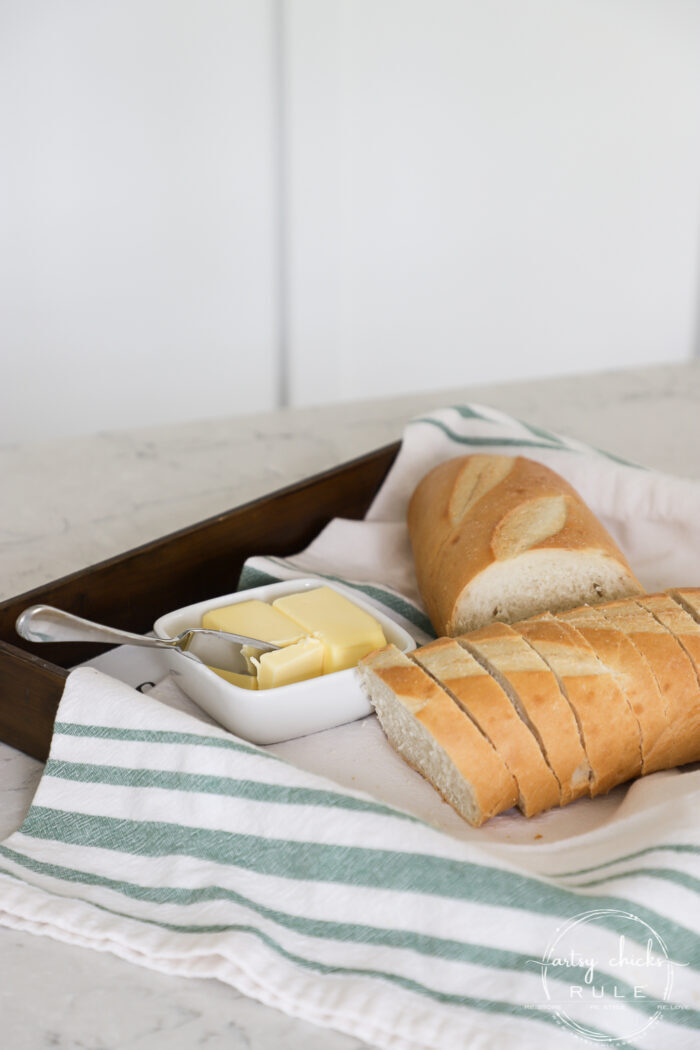 Old tray repurposed! This $3 "Give Us This Day Our Daily Bread Sign"/tray got a brand new look and life. artsychicksrule.com #repurposedfind #giveusthisday #biblequote #trayrepurposed 