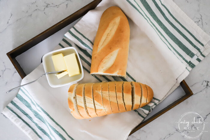 Old tray repurposed! This $3 "Give Us This Day Our Daily Bread Sign"/tray got a brand new look and life. artsychicksrule.com #repurposedfind #giveusthisday #biblequote #trayrepurposed 