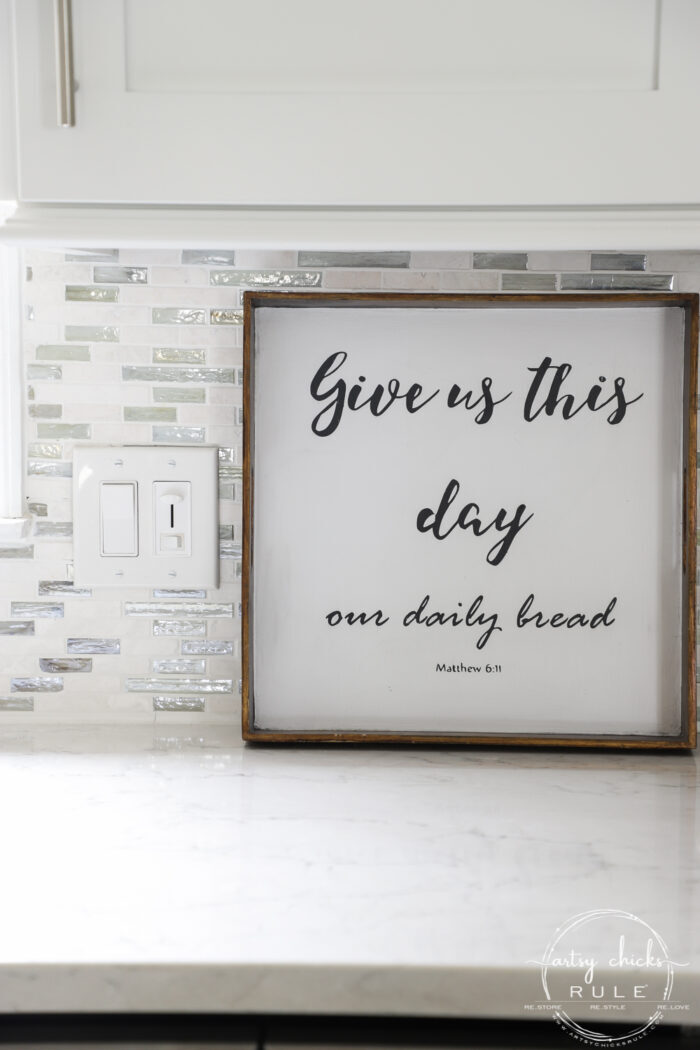 Old tray repurposed! This $3 "Give Us This Day Our Daily Bread Sign"/tray got a brand new look and life. artsychicksrule.com #repurposedfind #giveusthisday #biblequote #trayrepurposed 