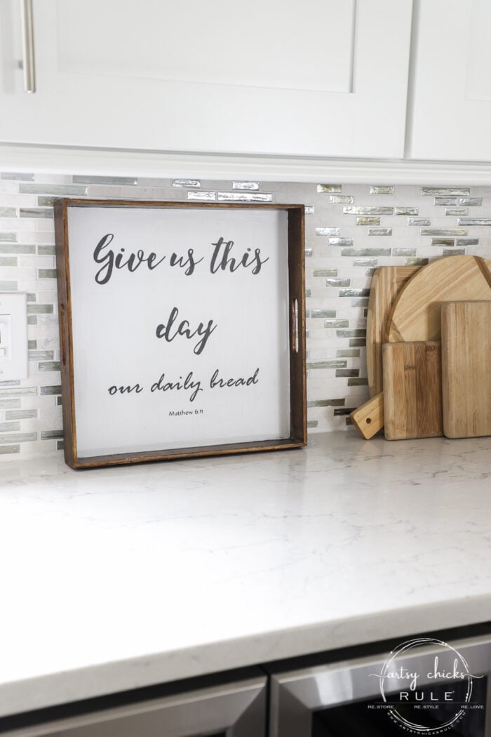 Old tray repurposed! This $3 "Give Us This Day Our Daily Bread Sign"/tray got a brand new look and life. artsychicksrule.com #repurposedfind #giveusthisday #biblequote #trayrepurposed 