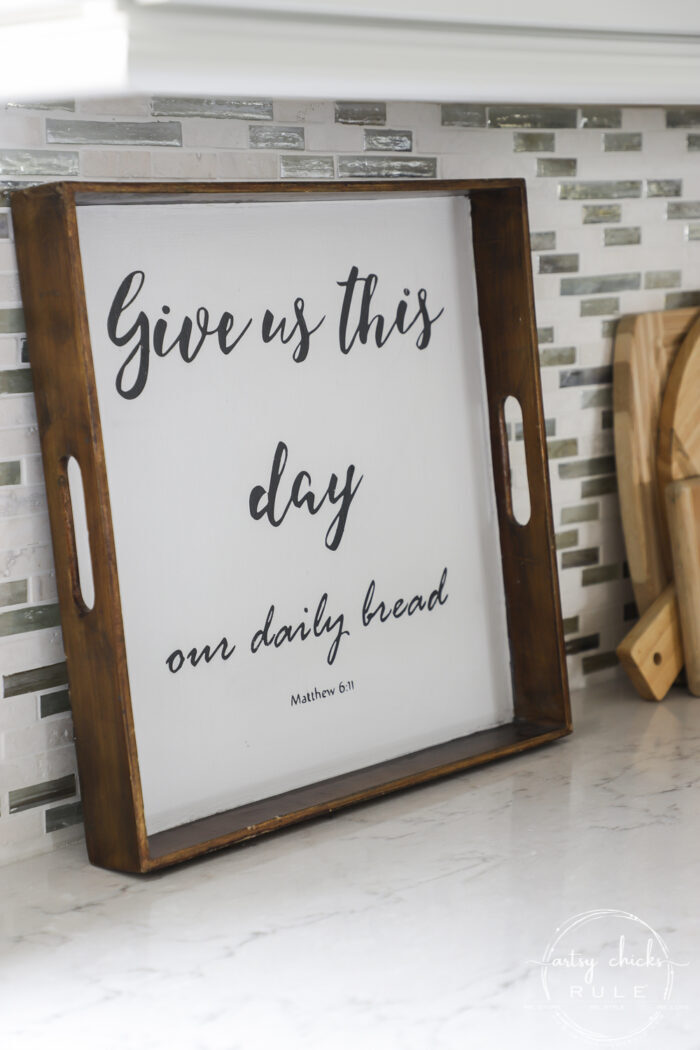 Old tray repurposed! This $3 "Give Us This Day Our Daily Bread Sign"/tray got a brand new look and life. artsychicksrule.com #repurposedfind #giveusthisday #biblequote #trayrepurposed 