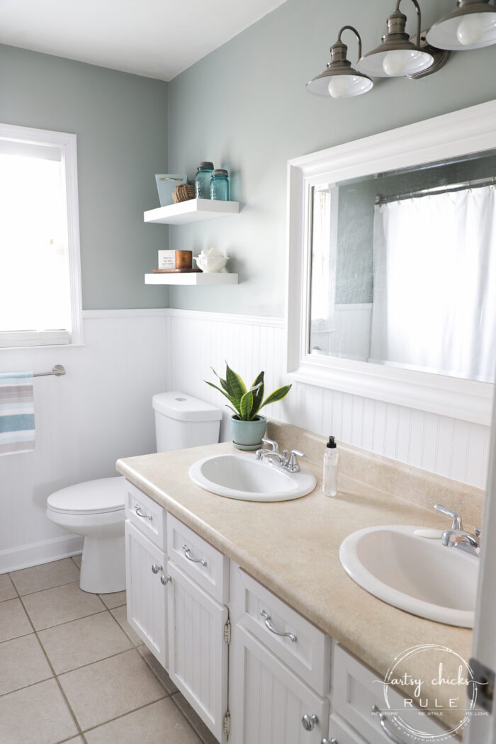 Sharing this hall bathroom mood board with a relaxed coastal design style. Rug, decor, sink cabinet and more! artsychicksrule.com #moodboard #bathmoodboard #bathdesignstyle #coastalstyle #relaxedcoastal