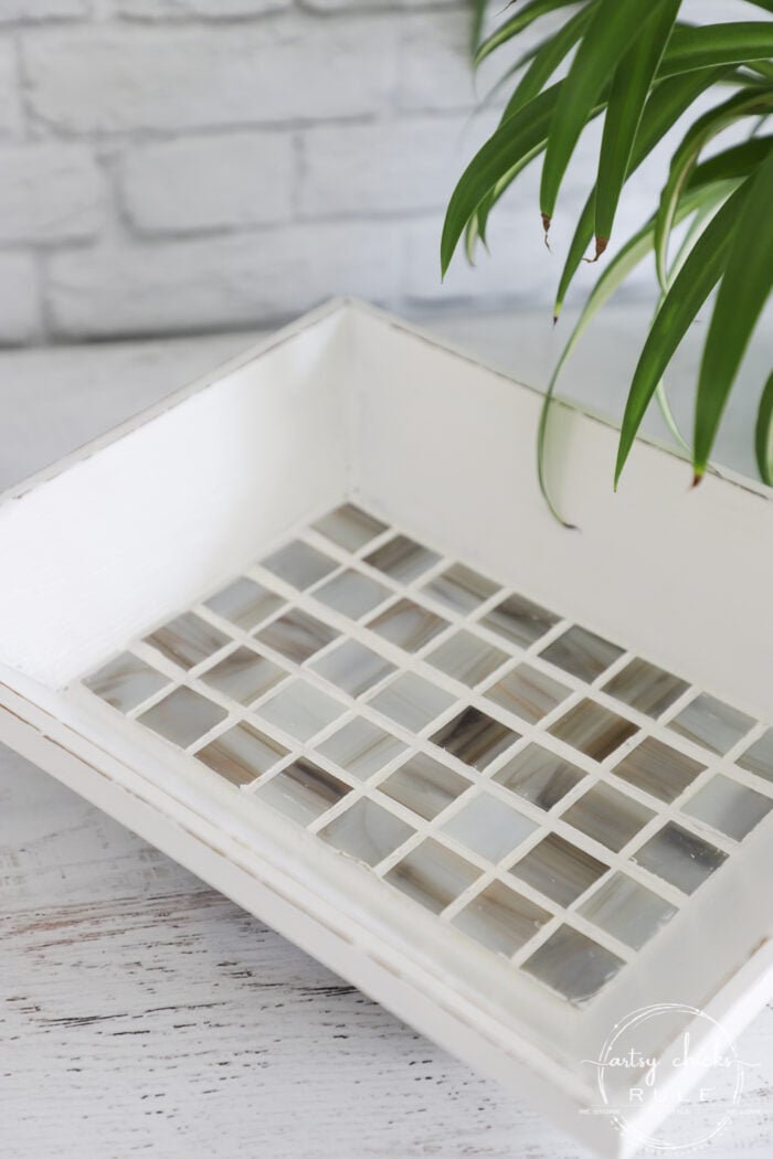 white wood bowl with tiles