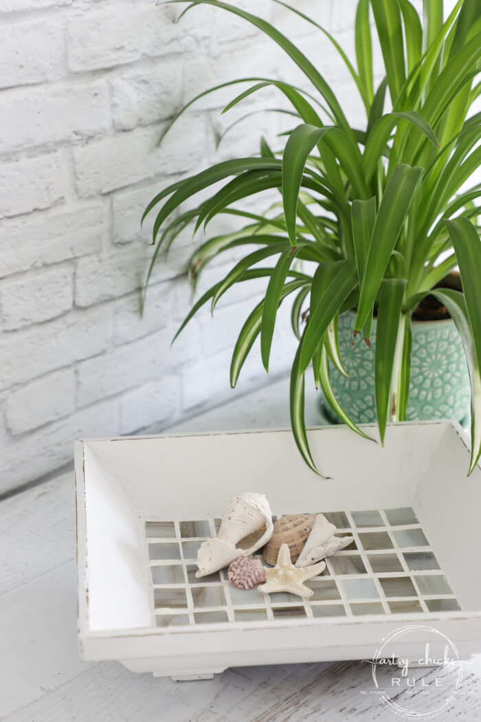 This $3 wood bowl makeover was simple to do with paint and tile (easier than you think!) artsychicksrule.com #woodbowlmakeover #tileprojects #tiledmakeovers