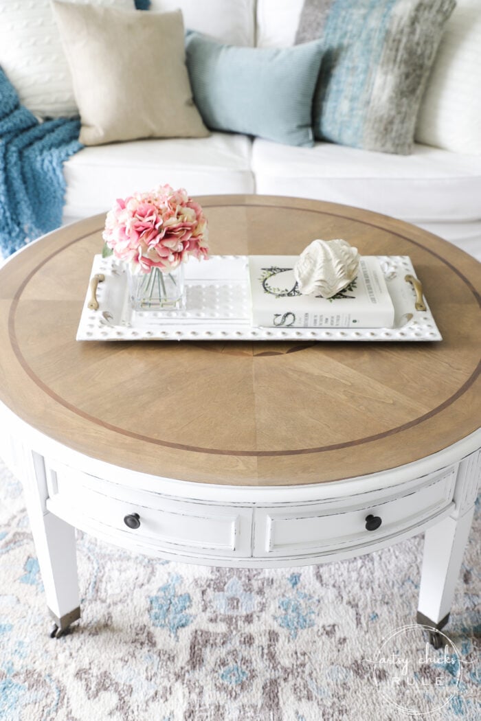 This $35 thrift store coffee table got a brand new, coastal style coffee table look ...with a little paint, stain and poly! Simple! artsychicksrule.com #coffeetablemakeover #coastalstyle #gelstain #chalkpaintedfurniture 