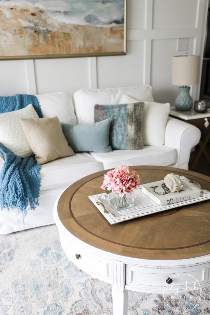 This $35 thrift store coffee table got a brand new, coastal style coffee table look ...with a little paint, stain and poly! Simple! artsychicksrule.com #coffeetablemakeover #coastalstyle #gelstain #chalkpaintedfurniture 