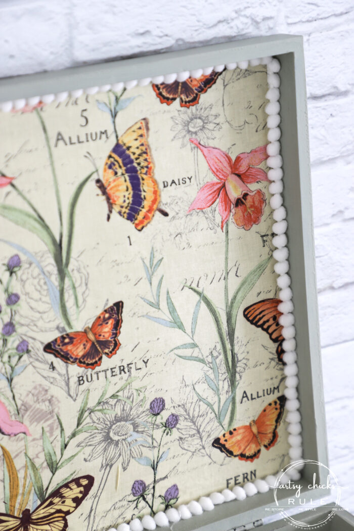 This old flatware box makeover uses pretty green paint, colorful new fabric and bird transfers for spring! Perfect for holding many things besides flatware! artsychicksrule.com #flatwarebox #silverwarebox #primadesigns #springprojects #fabricprojects