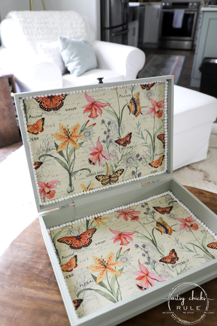 This old flatware box makeover uses pretty green paint, colorful new fabric and bird transfers for spring! Perfect for holding many things besides flatware! artsychicksrule.com #flatwarebox #silverwarebox #primadesigns #springprojects #fabricprojects