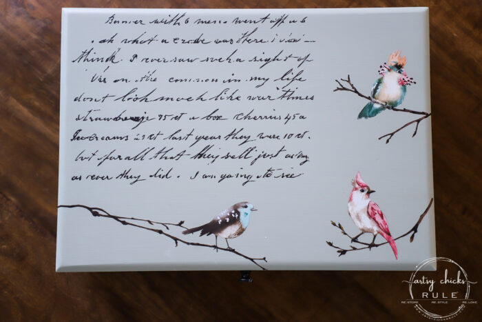 This old flatware box makeover uses pretty green paint, colorful new fabric and bird transfers for spring! Perfect for holding many things besides flatware! artsychicksrule.com #flatwarebox #silverwarebox #primadesigns #springprojects #fabricprojects