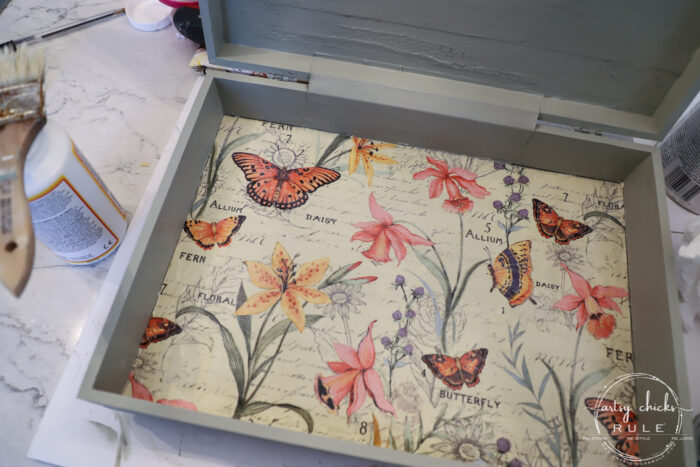 This old flatware box makeover uses pretty green paint, colorful new fabric and bird transfers for spring! Perfect for holding many things besides flatware! artsychicksrule.com #flatwarebox #silverwarebox #primadesigns #springprojects #fabricprojects