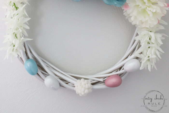 This adorable pink & blue bunny wreath is simple to throw together with just a few items! Perfect for spring and a fun project for kids! artsychicksrule.com #bunnywreath #pinkandbluewreath #springwreath #bunnyprojects