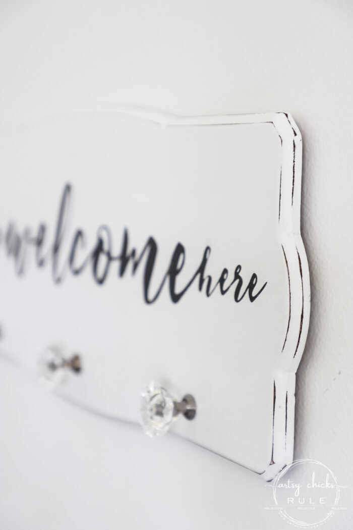 Create a welcoming sign with this "all are welcome here" free graphic I'm sharing! Plus see how I transformed this $3 thrift store find. artsychicksrule.com #freeprintable #allarewelcomehere #welcomesign #silhouettecameo