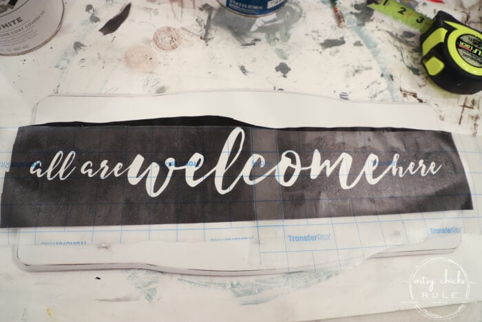 Create a welcoming sign with this "all are welcome here" free graphic I'm sharing! Plus see how I transformed this $3 thrift store find. artsychicksrule.com #freeprintable #allarewelcomehere #welcomesign #silhouettecameo