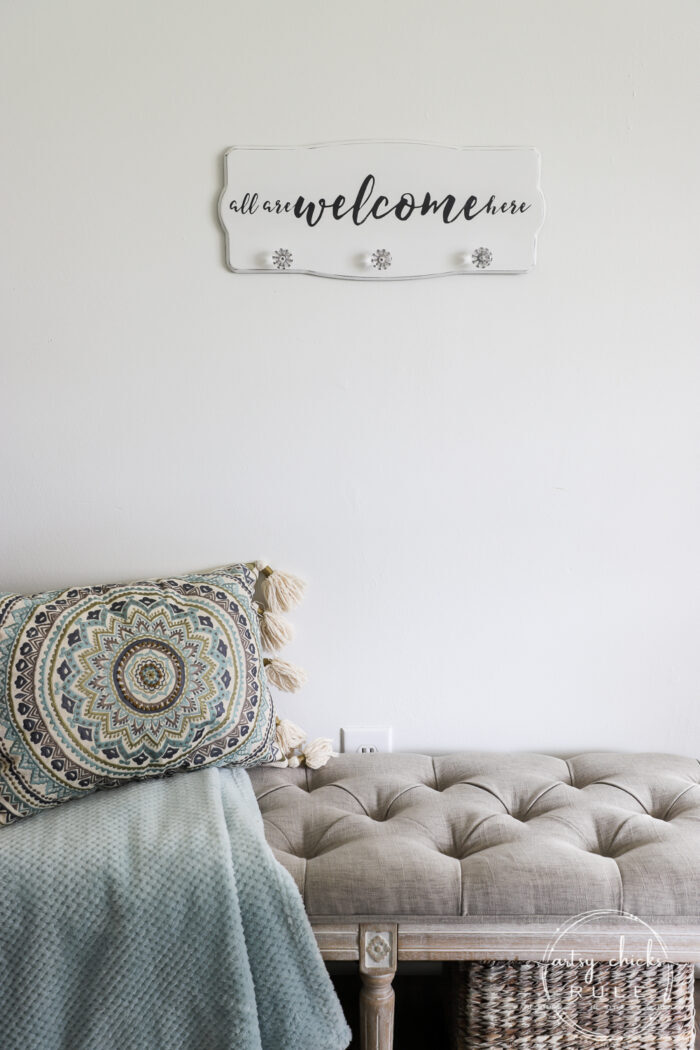 Create a welcoming sign with this "all are welcome here" free graphic I'm sharing! Plus see how I transformed this $3 thrift store find. artsychicksrule.com #freeprintable #allarewelcomehere #welcomesign #silhouettecameo