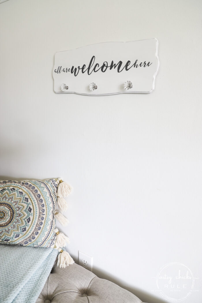 Create a welcoming sign with this "all are welcome here" free graphic I'm sharing! Plus see how I transformed this $3 thrift store find. artsychicksrule.com #freeprintable #allarewelcomehere #welcomesign #silhouettecameo