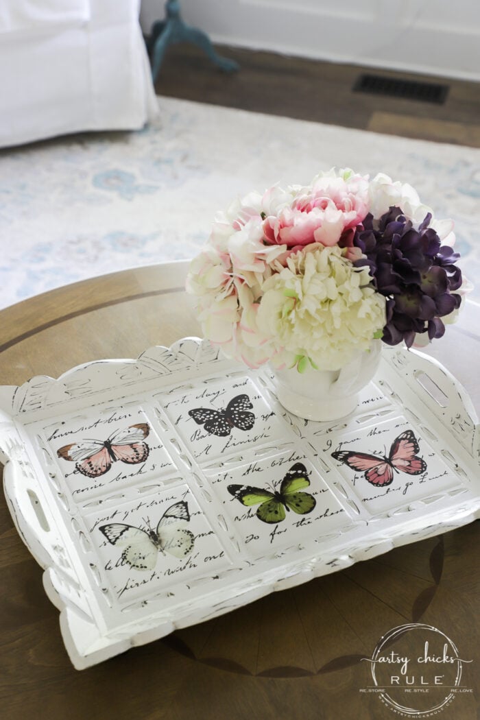 Butterfly transfers made transforming this butterfly tray makeover simple! (plus see how we found it in our brand new video!) artsychicksrule.com #butterflytray #butterflytransfers #primatransfers #butterflydecor