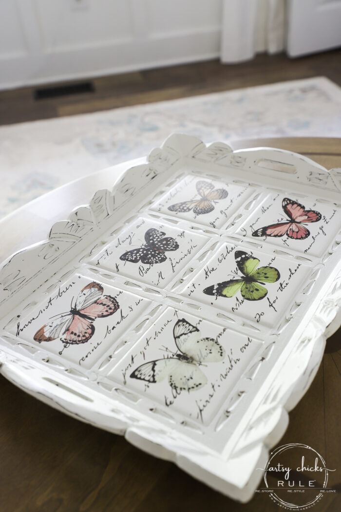 Butterfly transfers made transforming this butterfly tray makeover simple! (plus see how we found it in our brand new video!) artsychicksrule.com #butterflytray #butterflytransfers #primatransfers #butterflydecor