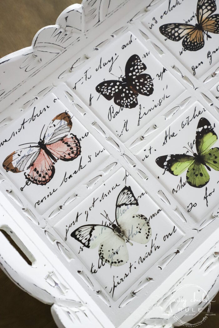 Butterfly transfers made transforming this butterfly tray makeover simple! (plus see how we found it in our brand new video!) artsychicksrule.com #butterflytray #butterflytransfers #primatransfers #butterflydecor