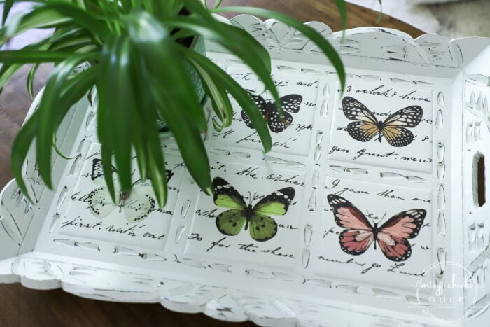 Butterfly transfers made transforming this butterfly tray makeover simple! (plus see how we found it in our brand new video!) artsychicksrule.com #butterflytray #butterflytransfers #primatransfers #butterflydecor