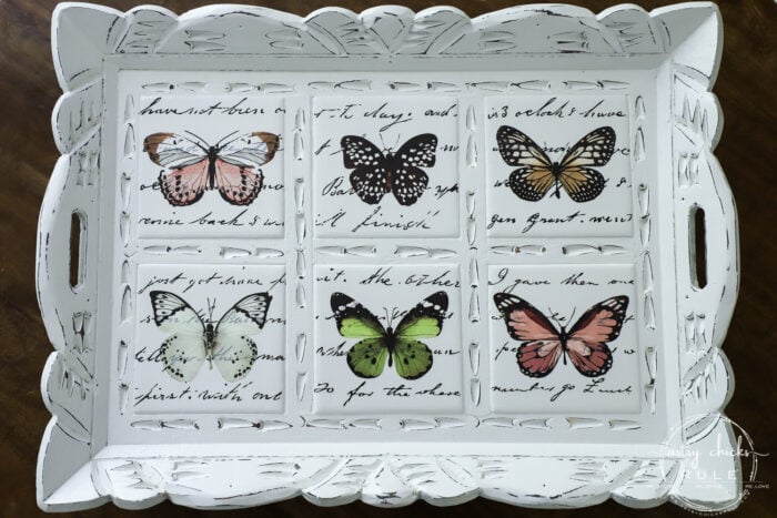 Butterfly transfers made transforming this butterfly tray makeover simple! (plus see how we found it in our brand new video!) artsychicksrule.com #butterflytray #butterflytransfers #primatransfers #butterflydecor