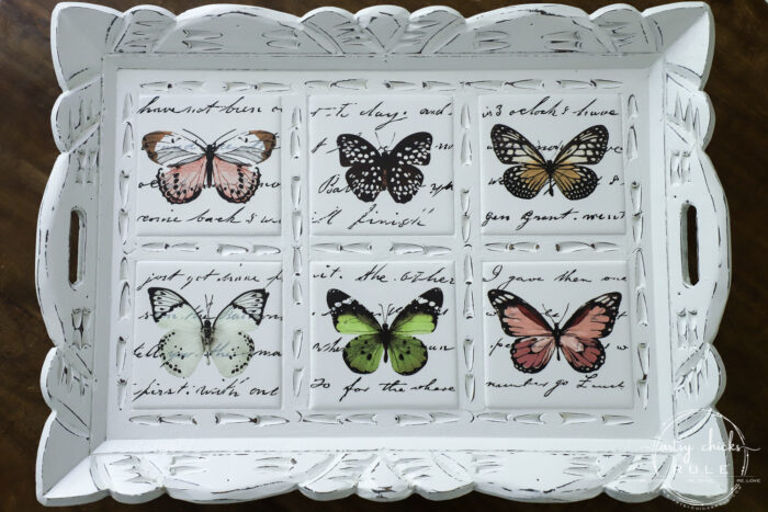 Butterfly transfers made transforming this butterfly tray makeover simple! (plus see how we found it in our brand new video!) artsychicksrule.com #butterflytray #butterflytransfers #primatransfers #butterflydecor