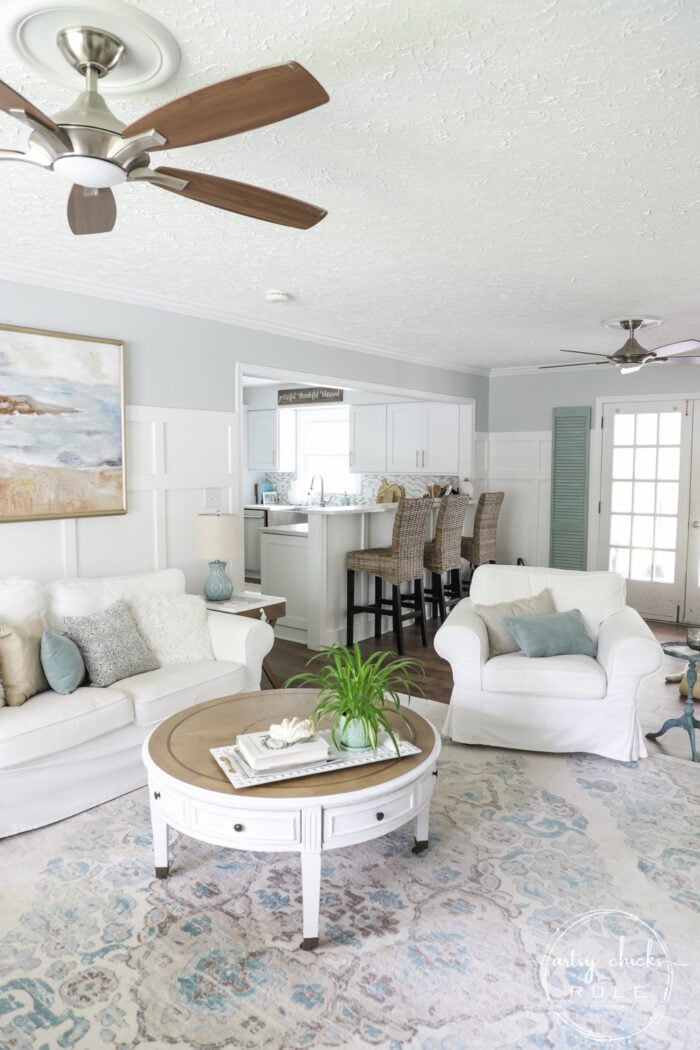 See this COASTAL living room go from dark and dreary to light and bright and airy! artsychicksrule.com #coastallivingroom #coastaldecor #coastalhome