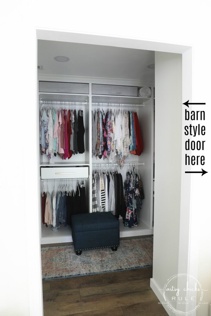 We created a "custom, built-in" master closet look with basic IKEA PAX closet system cabinets simply by adding trim and a few extra touches! artsychicksrule.com #builtincloset #ikeapax #paxclosethack #ikeapaxideas