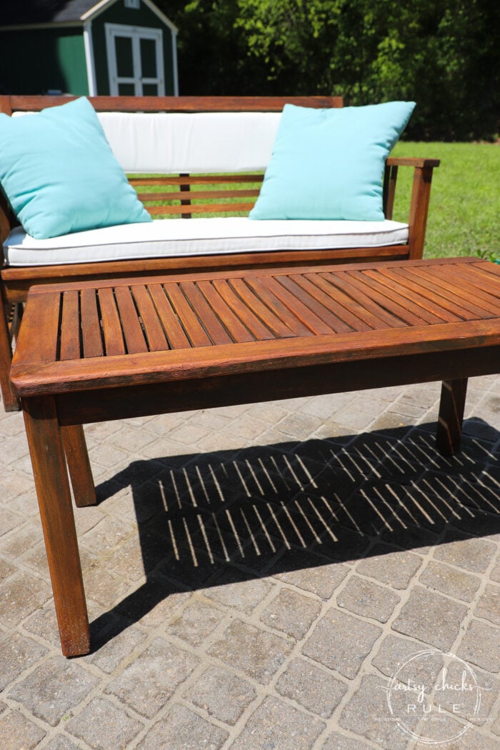 Learn how to quickly, and simply, refinish outdoor wood furniture with just one product! Make your patio furniture look better than brand new. artsychicksrule.com #restainoutdoorfurniture #refinishoutdoorfurniture #patiofurnituremakeover 