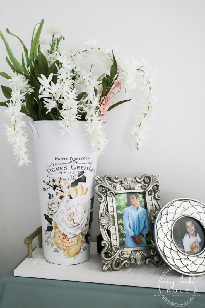 french floral bucket with flowers in it