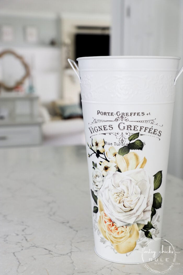 white bucket with white and yellow rose transfer on front