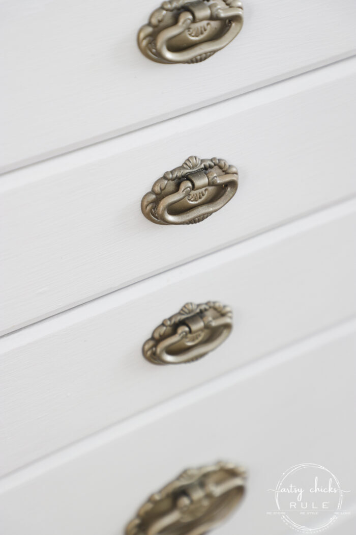 Outdated jewelry armoire makeover ... for the second time! Classy and elegant gold and white. Third times the charm! artsychicksrule.com #jewelryarmoire #whitefurniture #whiteandgold