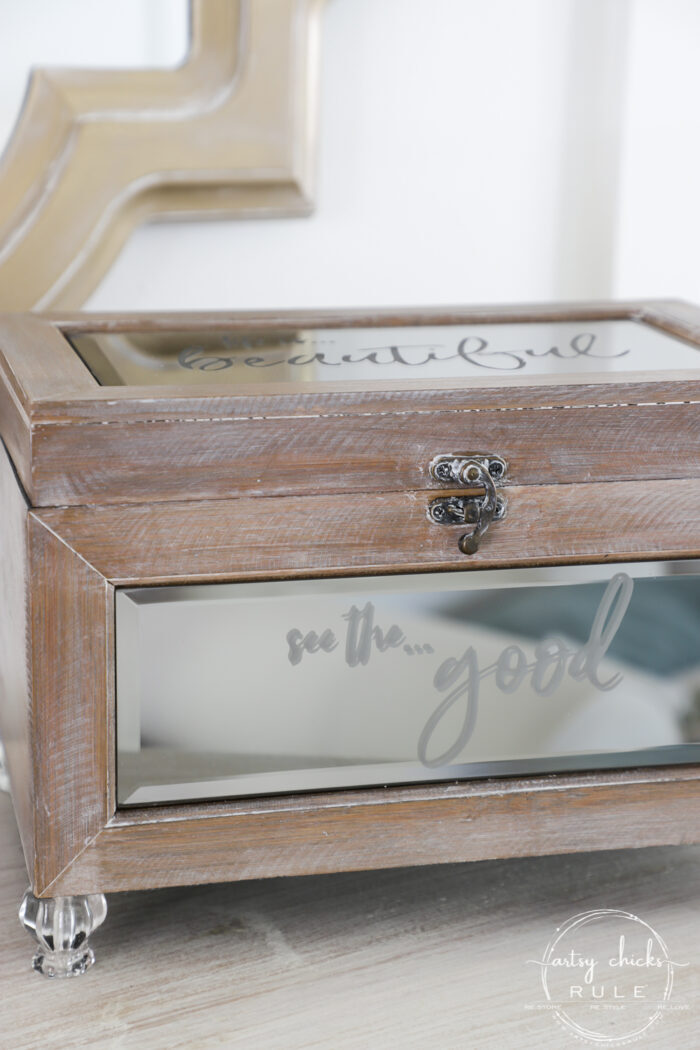 glass box with words etched in