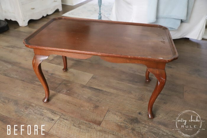 Elegant makeover on this navy blue coffee table with brown glaze! artsychicksrule.com #navybluefurniture #brownglaze 