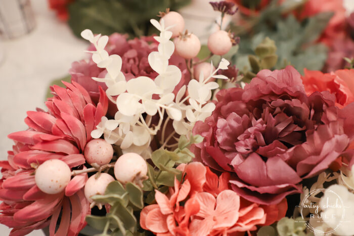 Using an old thrifty find, plus fall florals from the store, make this non tradtional fall floral centerpiece simply! artsychicksrule.com #fallfloralcenterpiece #fallflowers