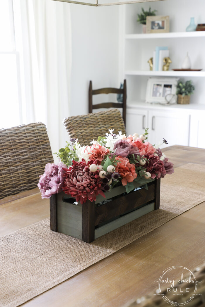 Using an old thrifty find, plus fall florals from the store, make this non tradtional fall floral centerpiece simply! artsychicksrule.com #fallfloralcenterpiece #fallflowers