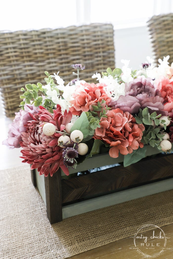 Using an old thrifty find, plus fall florals from the store, make this non tradtional fall floral centerpiece simply! artsychicksrule.com #fallfloralcenterpiece #fallflowers